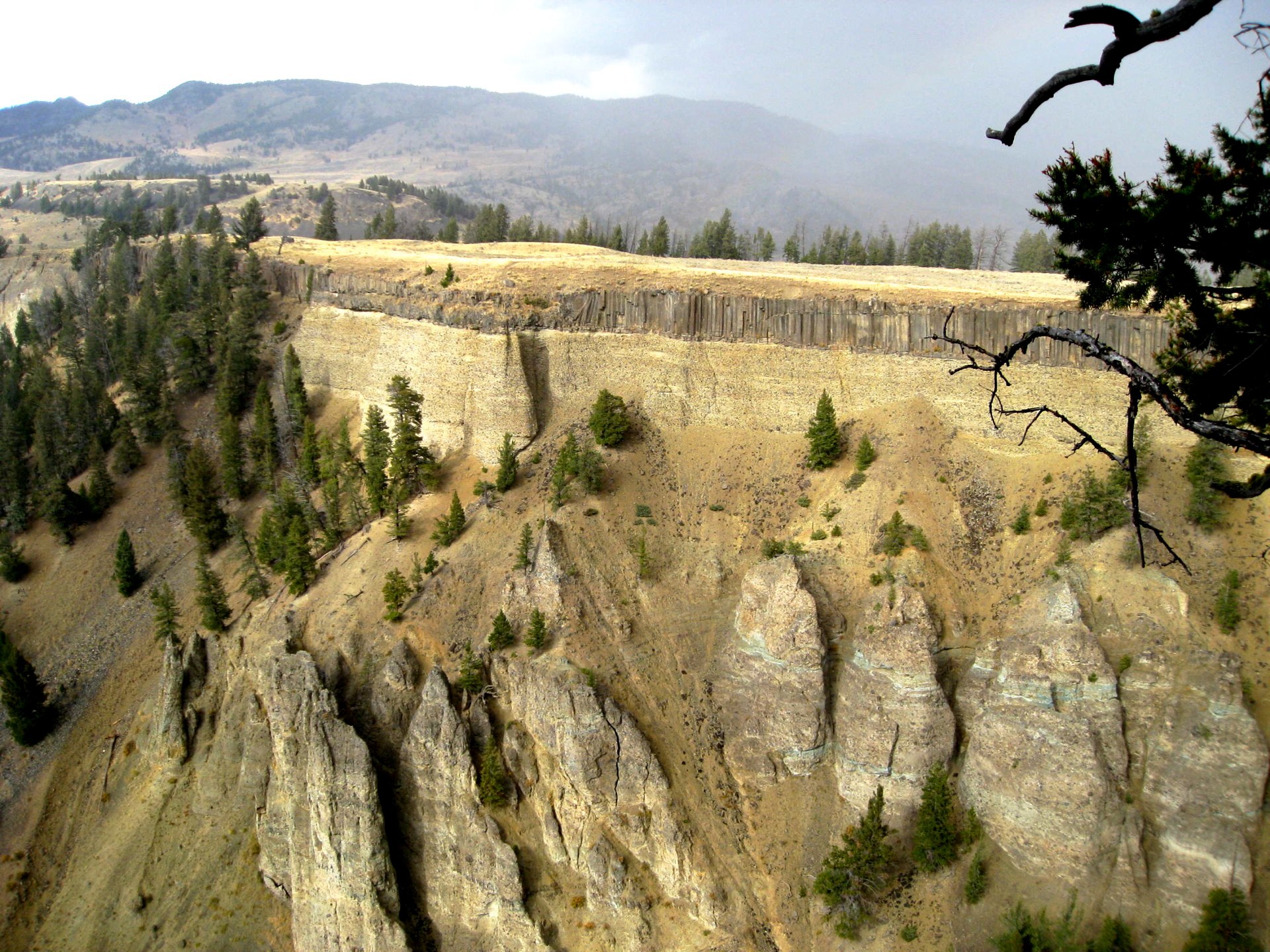 A volcano eruption made the horizontal marked stone formations