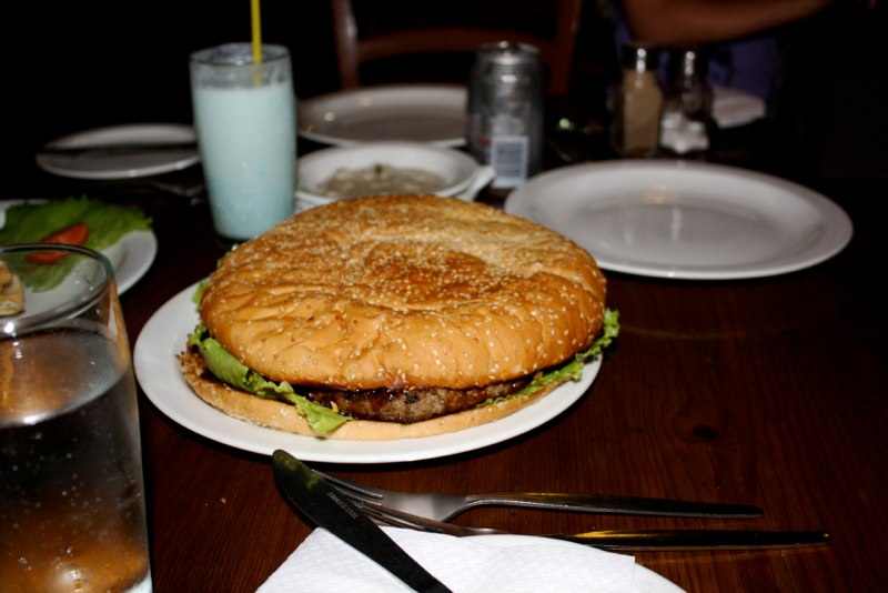 The BIGGEST hamburger we ever seen!! 1 for 4 peoples