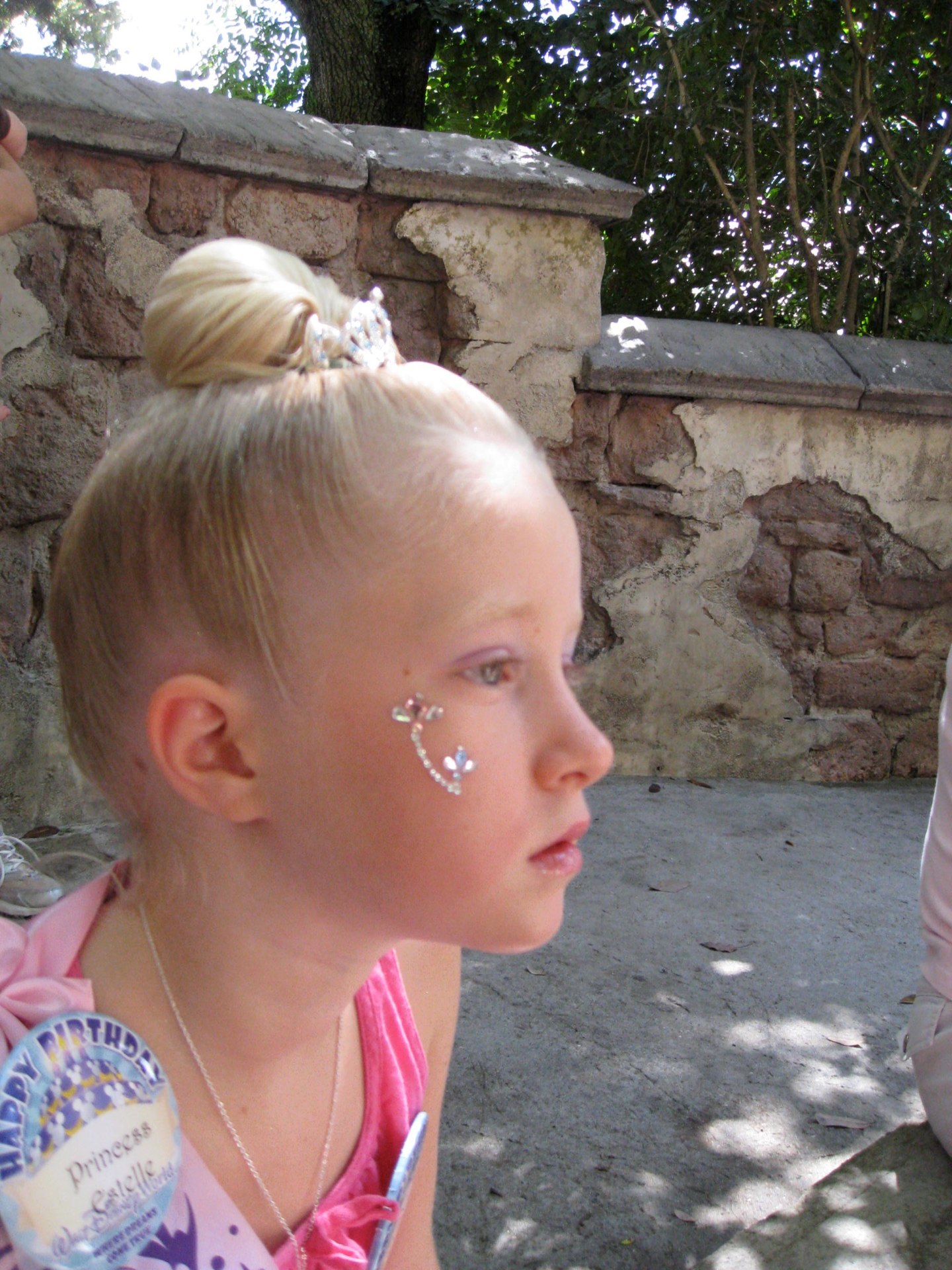 tattoo on her cheek