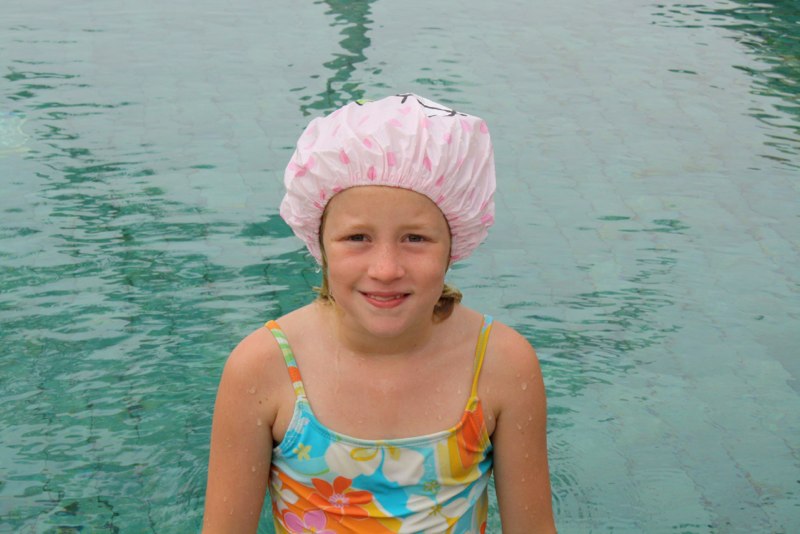 Estelle gets green hair in the pool so she have to wear this!