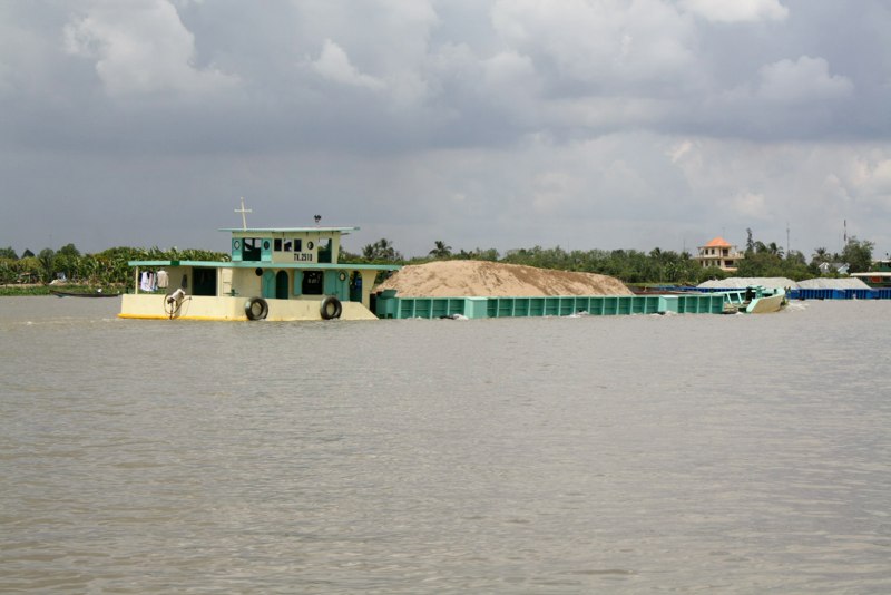 Check this LOAD!! the boat is almost under water!!
