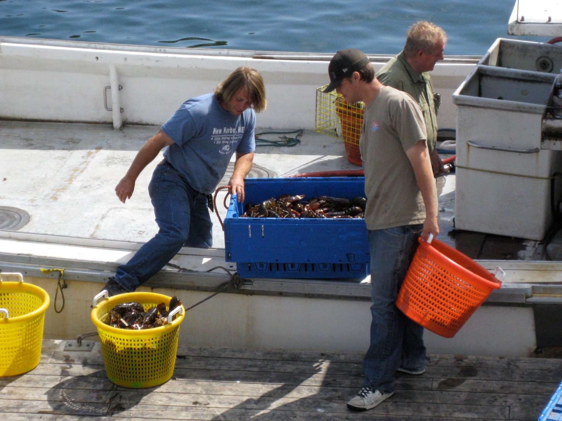 Fishermen with todays lobster catch
