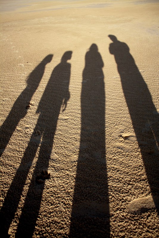 a family in the sand