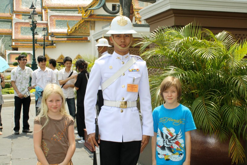 This guard took up HIS camera for us to take a photo of him/kids