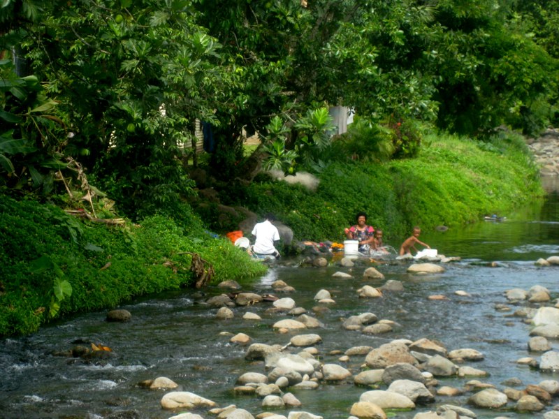 Washing clothes in a river