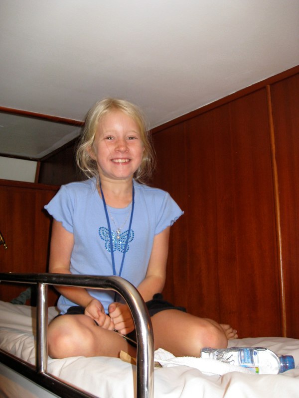 Excited girl on her first night train trip